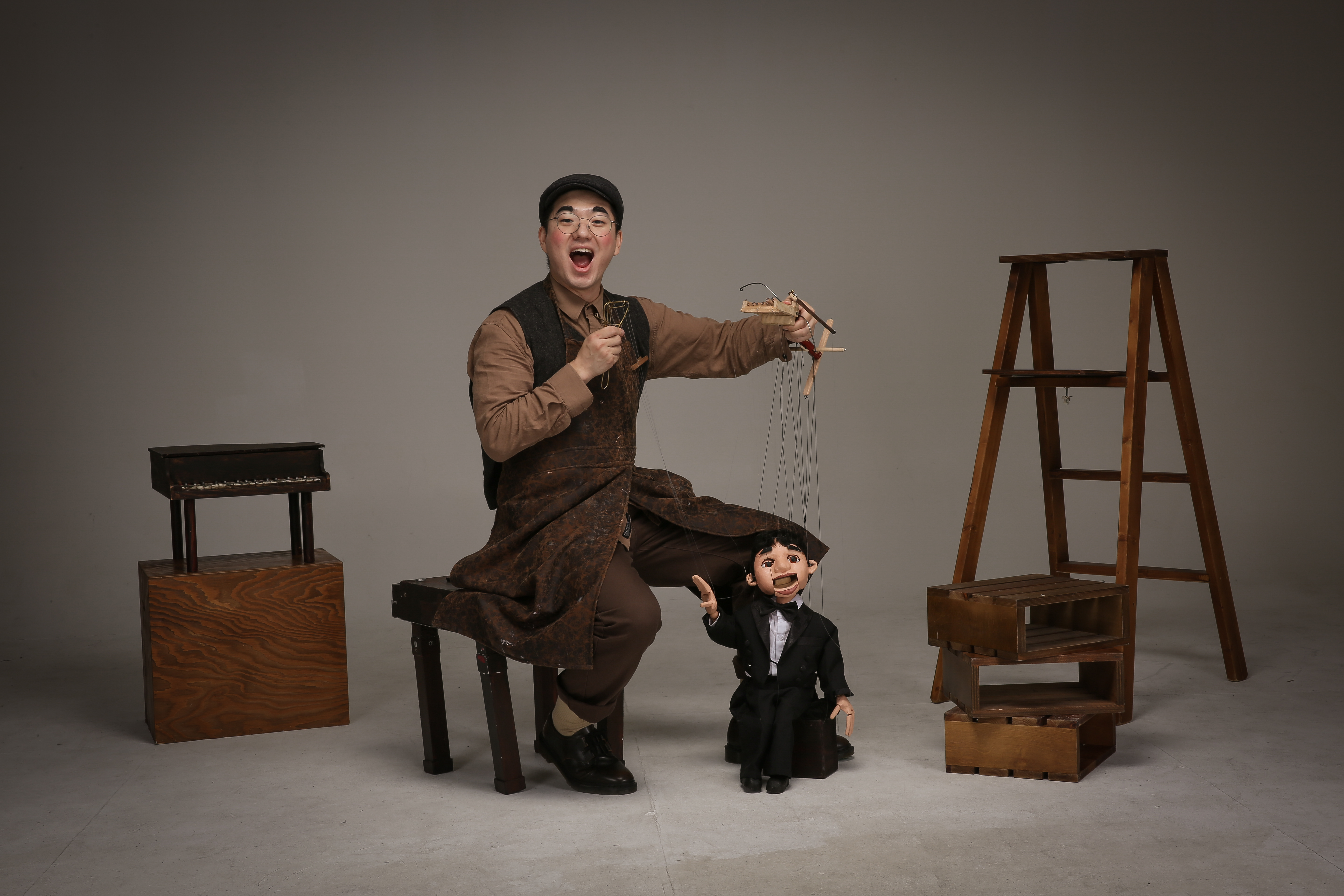 A Young Carpenter with Marionette